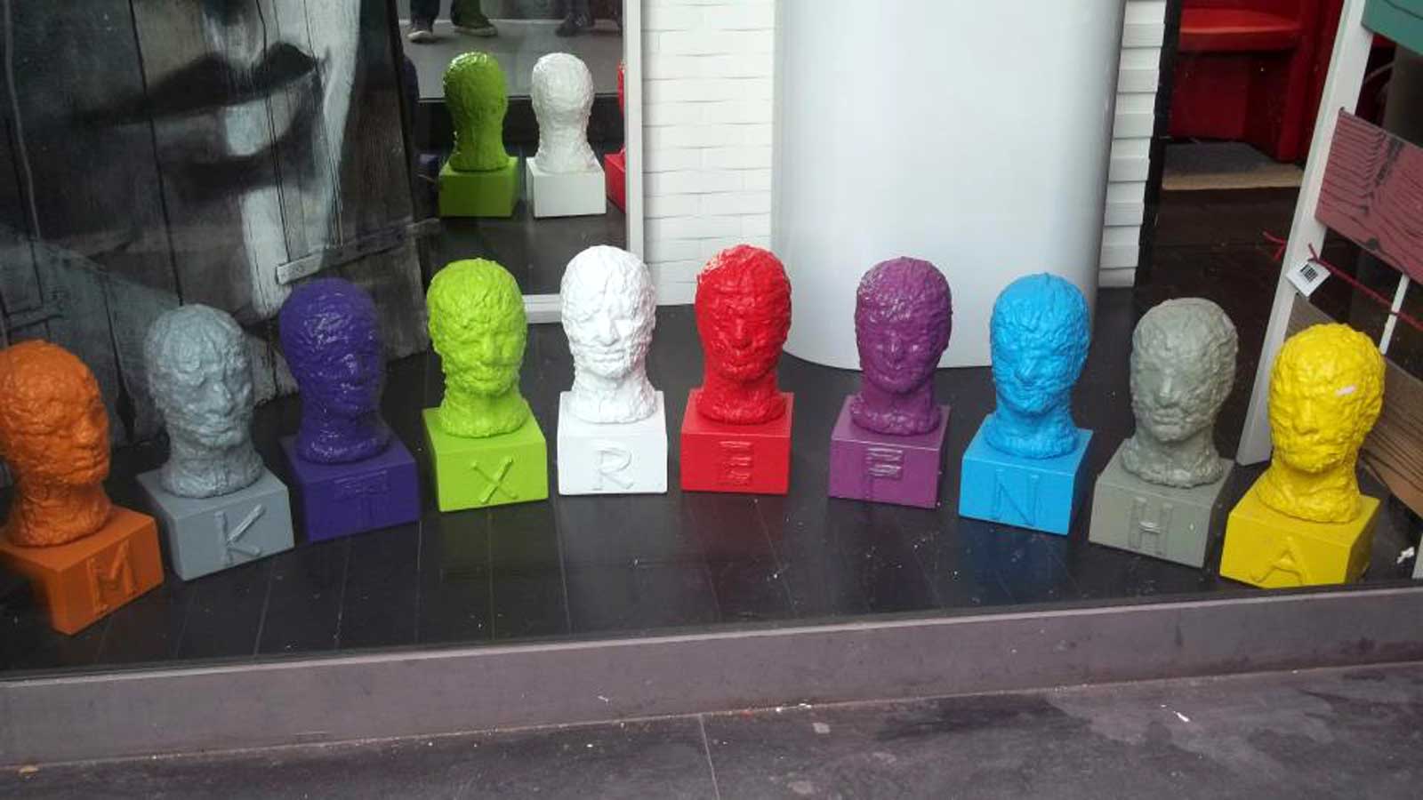 Heads, sculpture by Nicola Guerraz, acrylic on resin and iron, h 50 cm each, 2011, photo 03