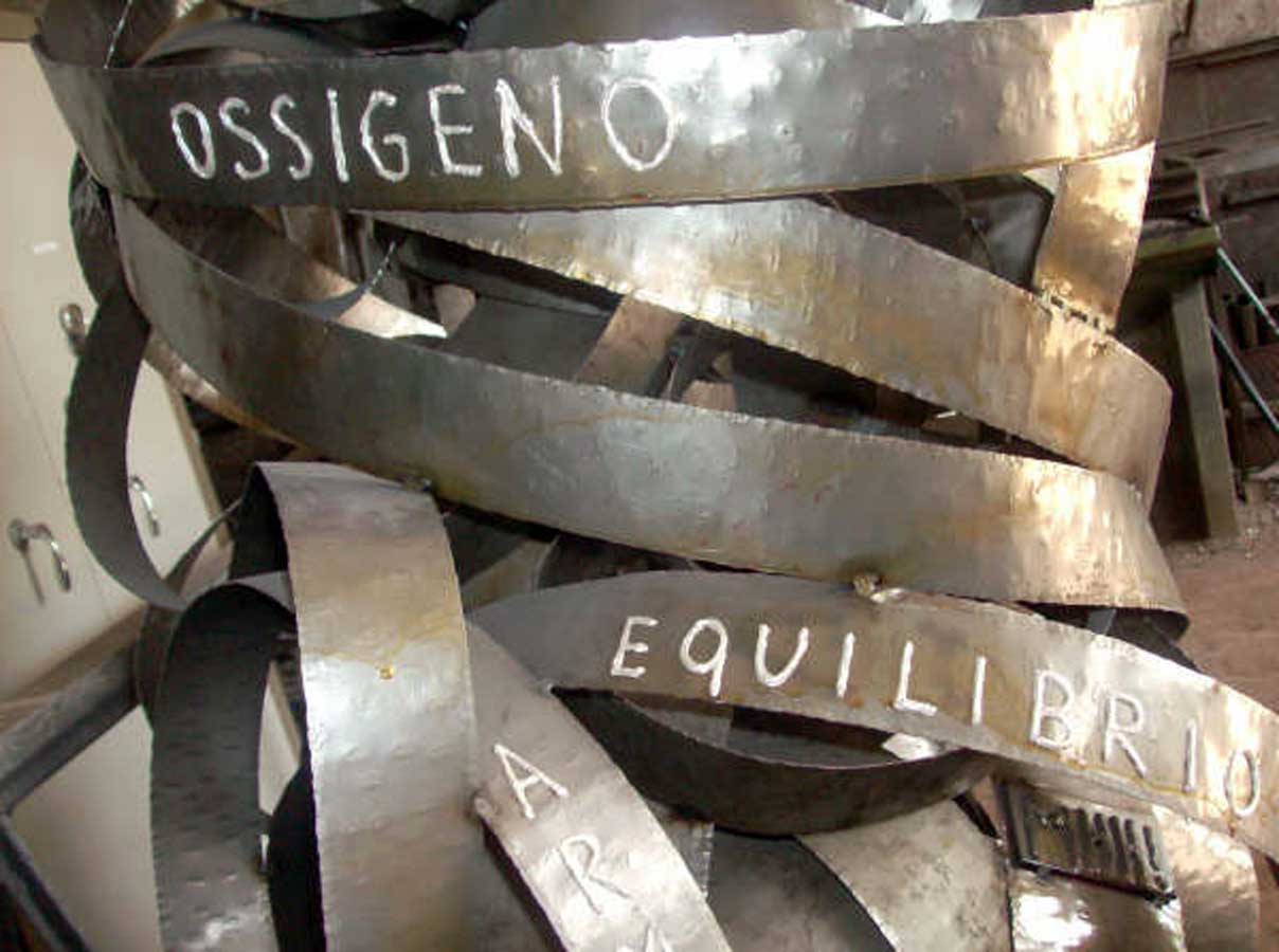 Poetry on iron, sculpture by Nicola Guerraz, steel, h 180 cm, 2011
