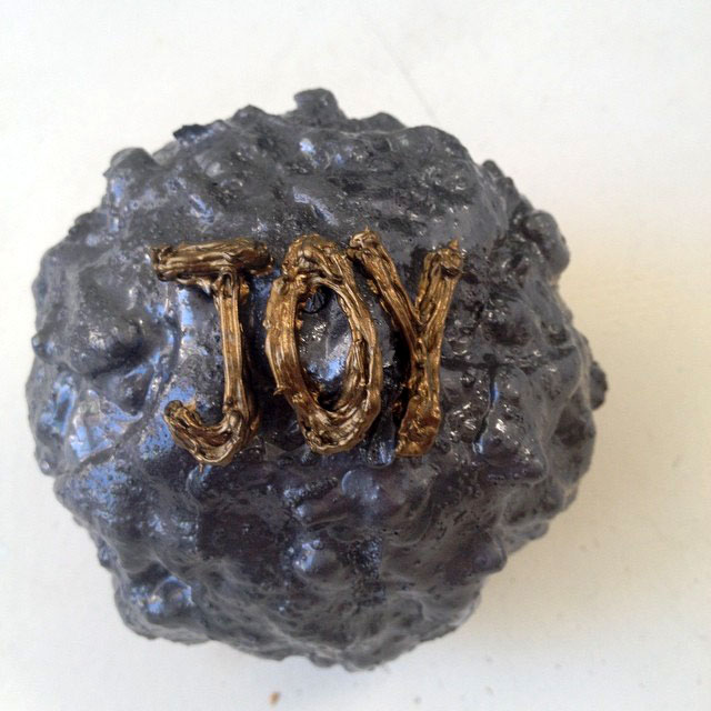 Joy 33, sculpture by Nicola Guerraz, mixed media on resin, diameter 12 cm, 2014