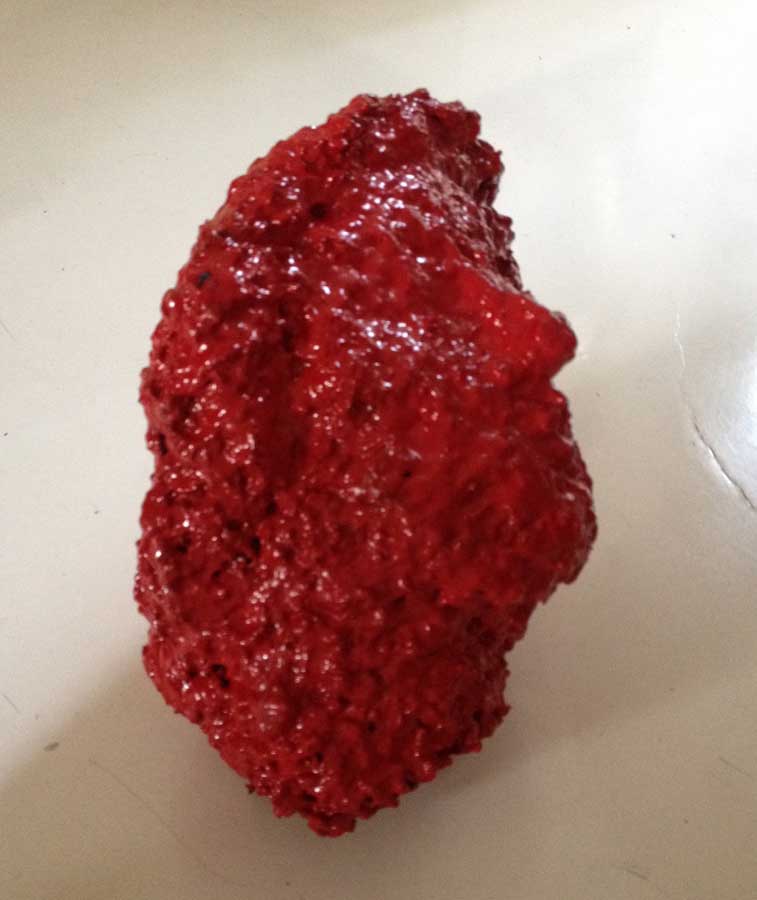 Man in red, sculpture by Nicola Guerraz, mixed media on plaster, h 36 cm, 2016